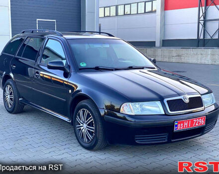 Черный Шкода Октавия, объемом двигателя 1.6 л и пробегом 245 тыс. км за 4950 $, фото 2 на Automoto.ua