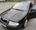 Черный Шкода Октавия, объемом двигателя 1.6 л и пробегом 260 тыс. км за 4800 $, фото 1 на Automoto.ua
