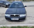 Черный Шкода Октавия, объемом двигателя 1.6 л и пробегом 260 тыс. км за 4800 $, фото 1 на Automoto.ua