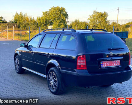 Черный Шкода Октавия, объемом двигателя 1.6 л и пробегом 245 тыс. км за 4950 $, фото 4 на Automoto.ua