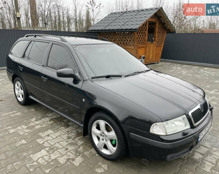 Черный Шкода Октавия, объемом двигателя 1.6 л и пробегом 348 тыс. км за 4200 $, фото 4 на Automoto.ua