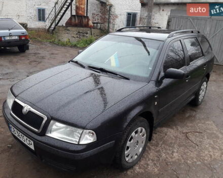 Черный Шкода Октавия, объемом двигателя 1.6 л и пробегом 204 тыс. км за 5200 $, фото 6 на Automoto.ua