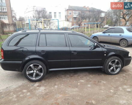 Черный Шкода Октавия, объемом двигателя 1.6 л и пробегом 204 тыс. км за 5200 $, фото 1 на Automoto.ua