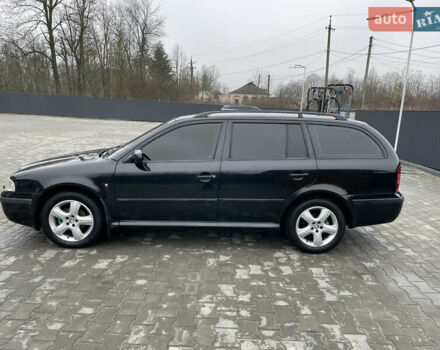 Черный Шкода Октавия, объемом двигателя 1.6 л и пробегом 348 тыс. км за 4200 $, фото 17 на Automoto.ua