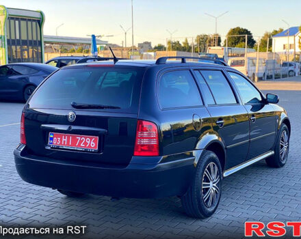 Черный Шкода Октавия, объемом двигателя 1.6 л и пробегом 245 тыс. км за 4950 $, фото 3 на Automoto.ua