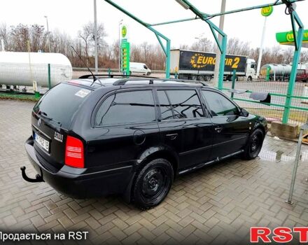 Чорний Шкода Октавія, об'ємом двигуна 1.6 л та пробігом 260 тис. км за 4700 $, фото 3 на Automoto.ua
