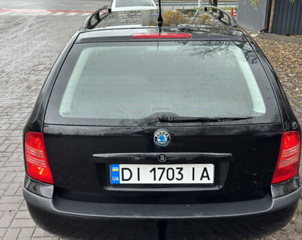 Черный Шкода Октавия, объемом двигателя 1.6 л и пробегом 215 тыс. км за 4800 $, фото 5 на Automoto.ua