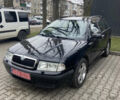 Черный Шкода Октавия, объемом двигателя 1.6 л и пробегом 210 тыс. км за 5600 $, фото 1 на Automoto.ua