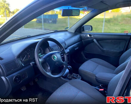 Черный Шкода Октавия, объемом двигателя 1.6 л и пробегом 245 тыс. км за 4950 $, фото 11 на Automoto.ua