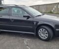 Черный Шкода Октавия, объемом двигателя 2 л и пробегом 235 тыс. км за 5395 $, фото 1 на Automoto.ua