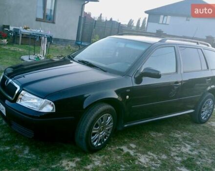 Черный Шкода Октавия, объемом двигателя 1.6 л и пробегом 220 тыс. км за 4600 $, фото 2 на Automoto.ua