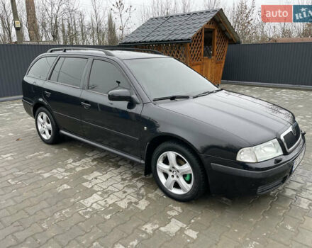 Черный Шкода Октавия, объемом двигателя 1.6 л и пробегом 348 тыс. км за 4200 $, фото 5 на Automoto.ua