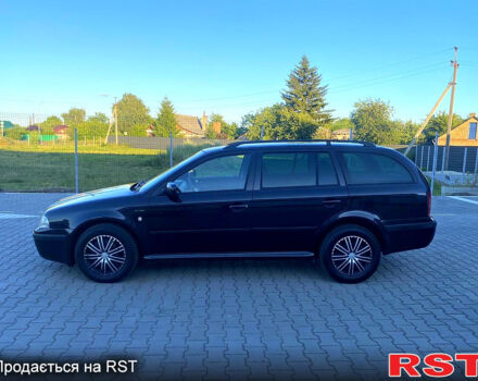 Черный Шкода Октавия, объемом двигателя 1.6 л и пробегом 245 тыс. км за 4950 $, фото 6 на Automoto.ua