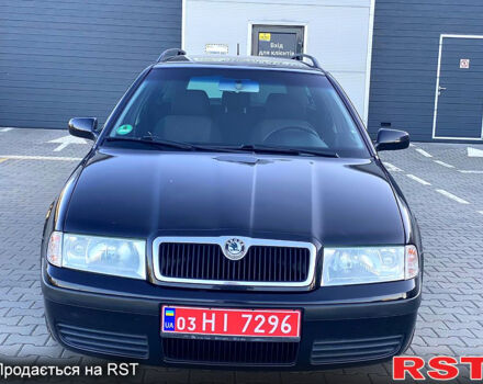 Черный Шкода Октавия, объемом двигателя 1.6 л и пробегом 245 тыс. км за 4950 $, фото 1 на Automoto.ua