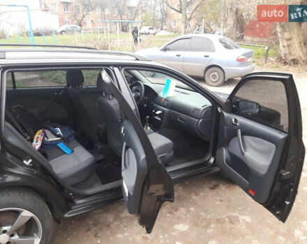 Черный Шкода Октавия, объемом двигателя 1.6 л и пробегом 204 тыс. км за 5200 $, фото 2 на Automoto.ua