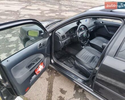 Черный Шкода Октавия, объемом двигателя 1.6 л и пробегом 309 тыс. км за 4100 $, фото 8 на Automoto.ua