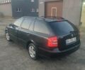 Черный Шкода Октавия, объемом двигателя 1.6 л и пробегом 213 тыс. км за 6000 $, фото 1 на Automoto.ua