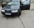 Черный Шкода Октавия, объемом двигателя 1.6 л и пробегом 255 тыс. км за 5300 $, фото 1 на Automoto.ua