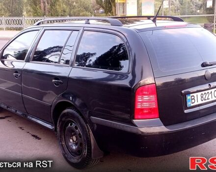 Черный Шкода Октавия, объемом двигателя 1.6 л и пробегом 200 тыс. км за 6000 $, фото 1 на Automoto.ua