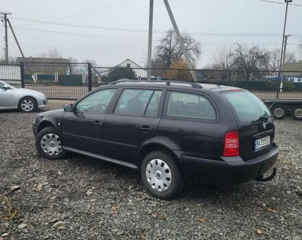 Черный Шкода Октавия, объемом двигателя 1.6 л и пробегом 155 тыс. км за 4450 $, фото 2 на Automoto.ua