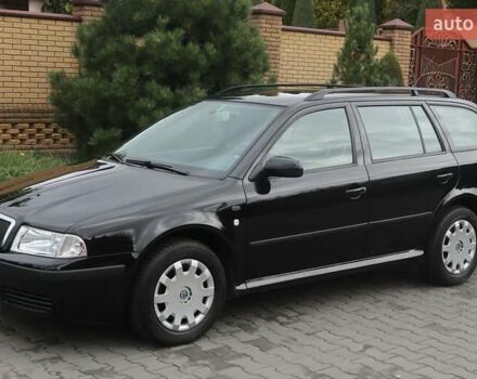 Черный Шкода Октавия, объемом двигателя 1.6 л и пробегом 200 тыс. км за 5400 $, фото 1 на Automoto.ua