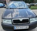 Черный Шкода Октавия, объемом двигателя 1.6 л и пробегом 290 тыс. км за 4500 $, фото 1 на Automoto.ua