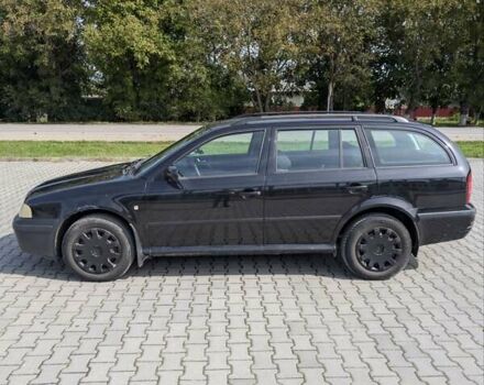 Черный Шкода Октавия, объемом двигателя 1.6 л и пробегом 257 тыс. км за 4100 $, фото 9 на Automoto.ua