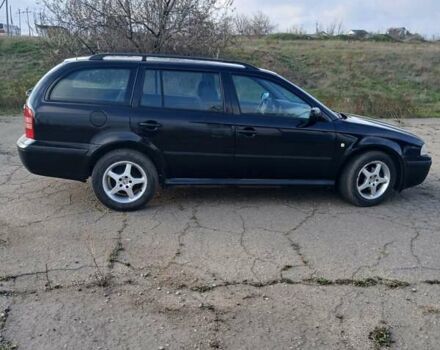 Черный Шкода Октавия, объемом двигателя 1.6 л и пробегом 274 тыс. км за 4250 $, фото 4 на Automoto.ua