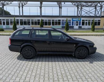 Черный Шкода Октавия, объемом двигателя 1.6 л и пробегом 257 тыс. км за 4100 $, фото 8 на Automoto.ua
