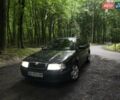 Черный Шкода Октавия, объемом двигателя 1.6 л и пробегом 325 тыс. км за 3800 $, фото 1 на Automoto.ua