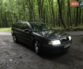 Черный Шкода Октавия, объемом двигателя 1.6 л и пробегом 325 тыс. км за 3800 $, фото 1 на Automoto.ua