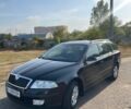 Черный Шкода Октавия, объемом двигателя 1.6 л и пробегом 268 тыс. км за 5700 $, фото 1 на Automoto.ua