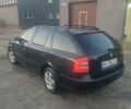 Черный Шкода Октавия, объемом двигателя 1.6 л и пробегом 213 тыс. км за 6000 $, фото 1 на Automoto.ua