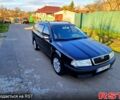 Черный Шкода Октавия, объемом двигателя 2 л и пробегом 249 тыс. км за 5000 $, фото 1 на Automoto.ua
