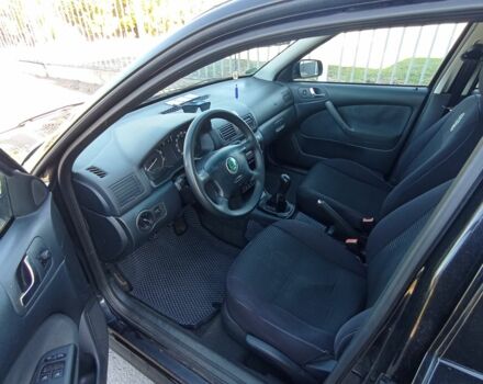 Черный Шкода Октавия, объемом двигателя 1.6 л и пробегом 242 тыс. км за 5200 $, фото 10 на Automoto.ua