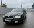 Черный Шкода Октавия, объемом двигателя 1.6 л и пробегом 210 тыс. км за 5000 $, фото 1 на Automoto.ua