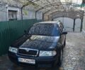Черный Шкода Октавия, объемом двигателя 1.6 л и пробегом 158 тыс. км за 5200 $, фото 1 на Automoto.ua