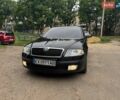 Черный Шкода Октавия, объемом двигателя 1.6 л и пробегом 208 тыс. км за 5600 $, фото 1 на Automoto.ua
