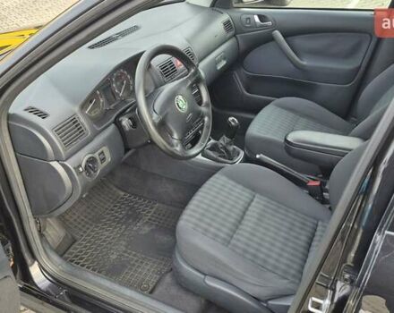 Черный Шкода Октавия, объемом двигателя 1.6 л и пробегом 217 тыс. км за 5700 $, фото 19 на Automoto.ua