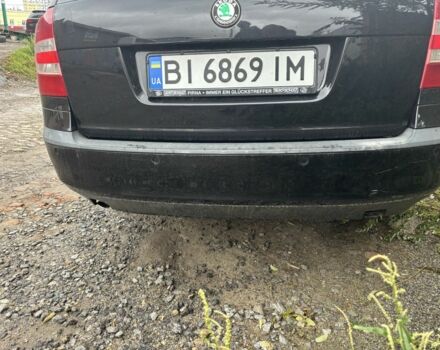 Черный Шкода Октавия, объемом двигателя 1.6 л и пробегом 300 тыс. км за 3500 $, фото 1 на Automoto.ua