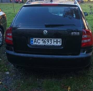 Чорний Шкода Октавія, об'ємом двигуна 2 л та пробігом 259 тис. км за 6400 $, фото 4 на Automoto.ua