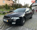 Черный Шкода Октавия, объемом двигателя 1.6 л и пробегом 203 тыс. км за 6300 $, фото 1 на Automoto.ua