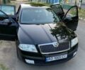 Чорний Шкода Октавія, об'ємом двигуна 2 л та пробігом 249 тис. км за 6500 $, фото 1 на Automoto.ua