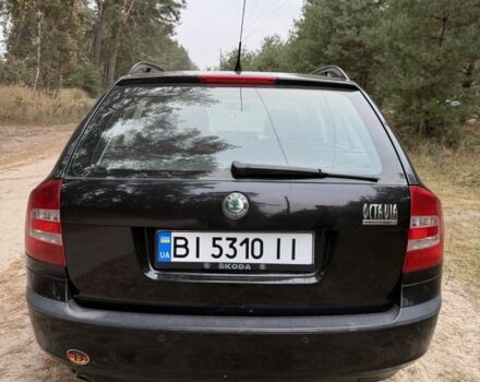 Черный Шкода Октавия, объемом двигателя 1.6 л и пробегом 220 тыс. км за 5450 $, фото 7 на Automoto.ua