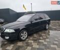Черный Шкода Октавия, объемом двигателя 1.6 л и пробегом 184 тыс. км за 5950 $, фото 1 на Automoto.ua