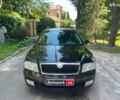 Чорний Шкода Октавія, об'ємом двигуна 2 л та пробігом 241 тис. км за 6990 $, фото 1 на Automoto.ua