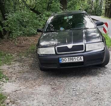 Черный Шкода Октавия, объемом двигателя 1.6 л и пробегом 420 тыс. км за 4900 $, фото 3 на Automoto.ua