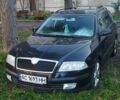 Чорний Шкода Октавія, об'ємом двигуна 2 л та пробігом 259 тис. км за 6400 $, фото 1 на Automoto.ua