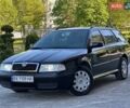 Черный Шкода Октавия, объемом двигателя 1.6 л и пробегом 255 тыс. км за 5300 $, фото 1 на Automoto.ua