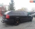Черный Шкода Октавия, объемом двигателя 2 л и пробегом 200 тыс. км за 5500 $, фото 3 на Automoto.ua